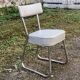 Set of 2 chairs and 1 armchair from the 70s in chrome metal and faux leather.