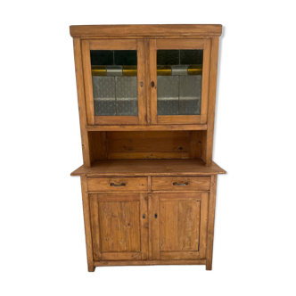 Antique dresser with glass doors and fleur-de-lys from the 50s