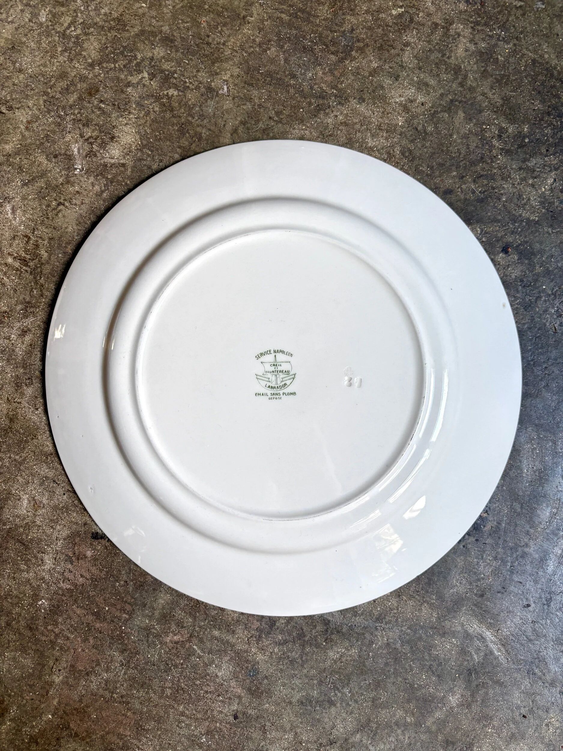 Round Creil & Montereau dish in green earthenware, "Napoleon" service