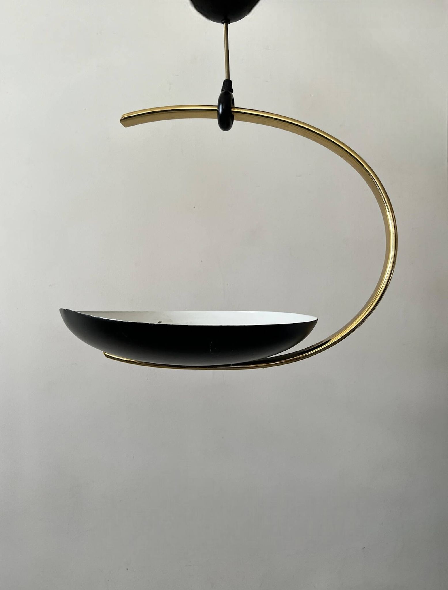 Black metal and brass arc pendant light "Les Activités" by Lucien Gau, Paris 1960