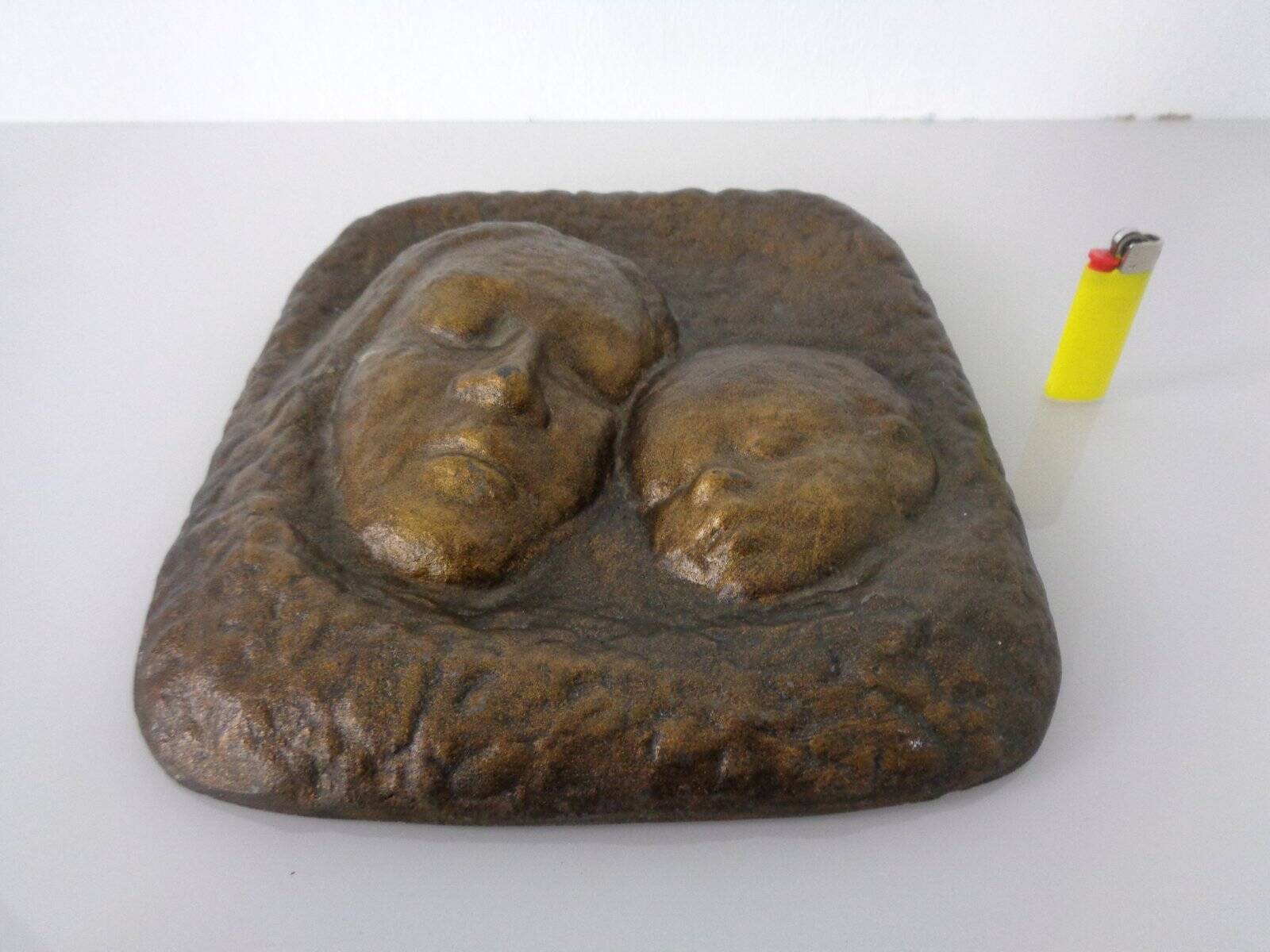 German bronze relief of mother with baby, 1940s.