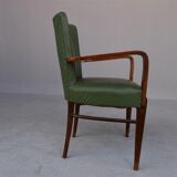 Paire de fauteuils 1940 en skaï vert et hêtre