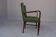 Paire de fauteuils 1940 en skaï vert et hêtre