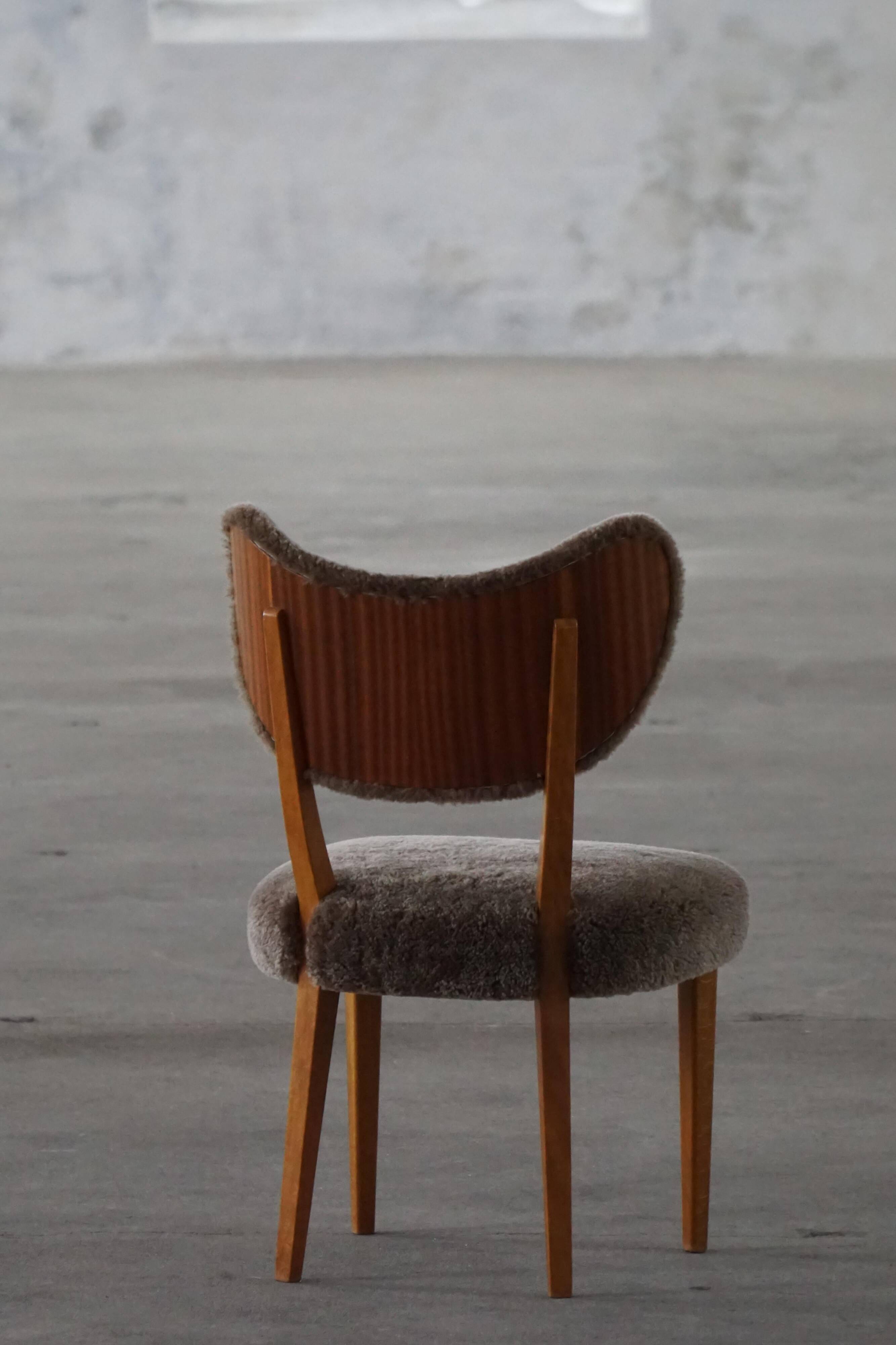 Danish chair from the mid-20th century, dining/office chair in lamb's wool, Eva Koppel, 1950s.