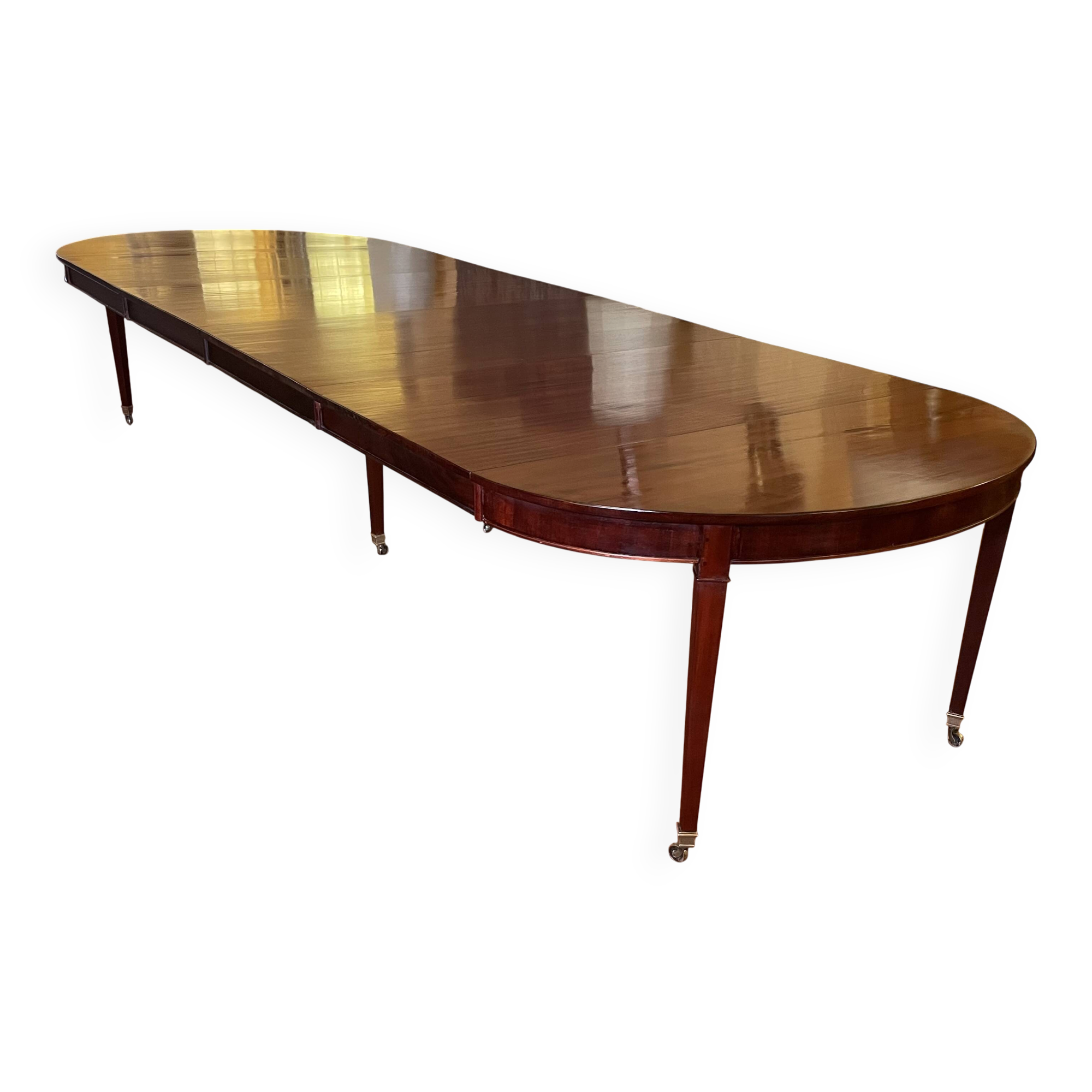 Extensible Louis XVI dining table in period Directoire mahogany.