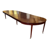 Extensible Louis XVI dining table in period Directoire mahogany.