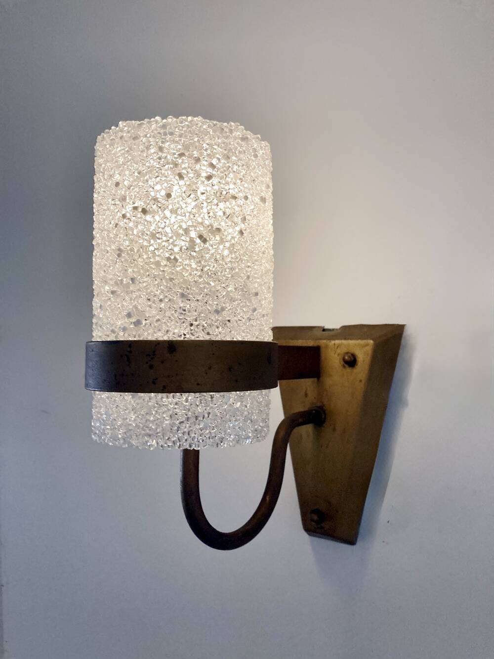 Set of three wall sconces in gold metal and ice effect Perspex, 1960-70.