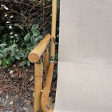 Rattan armchair and foldable canvas