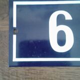 Enamelled street sign bears the number 6
