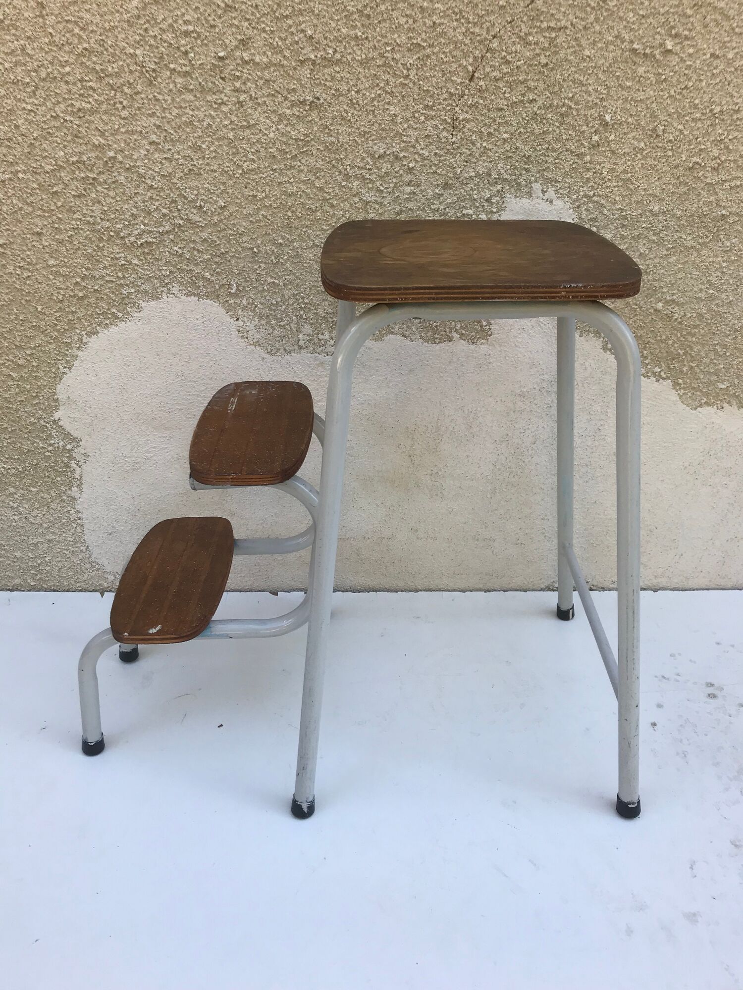 Antique grey metal step ladder