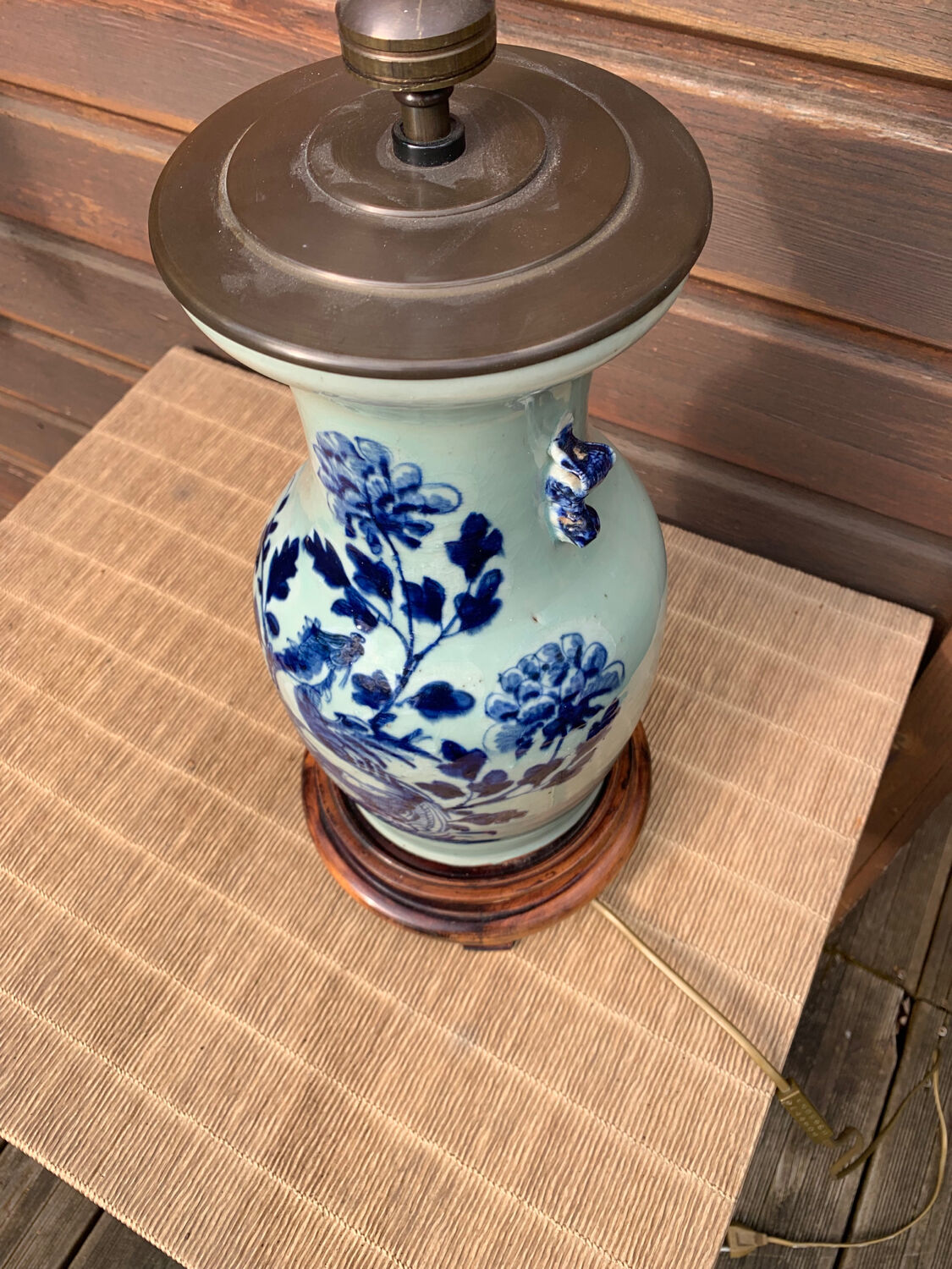 Celadon blue porcelain lamp with vegetal decoration, China, 19th century