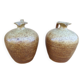 Pair of small antique stoneware oil jars
