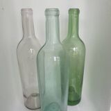 Set of 3 transparent glass bottles
