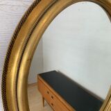 Oval mirror Louis XVI style in gilded wood