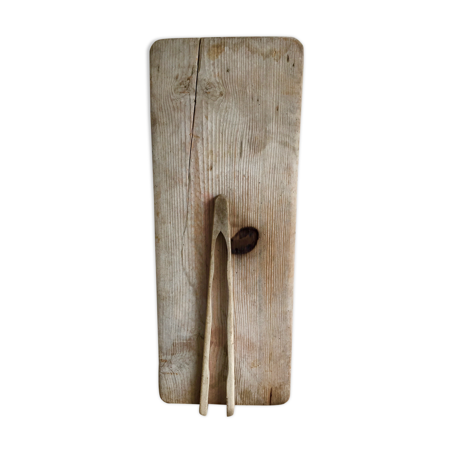 Wooden board with pliers