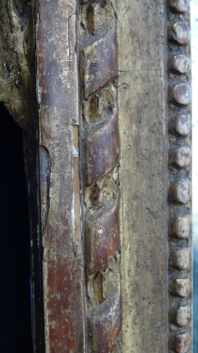 Louis XVI period mirror in gilded carved wood