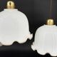 Set of 3 vintage bell-shaped pendants in white opaline with brown trim.