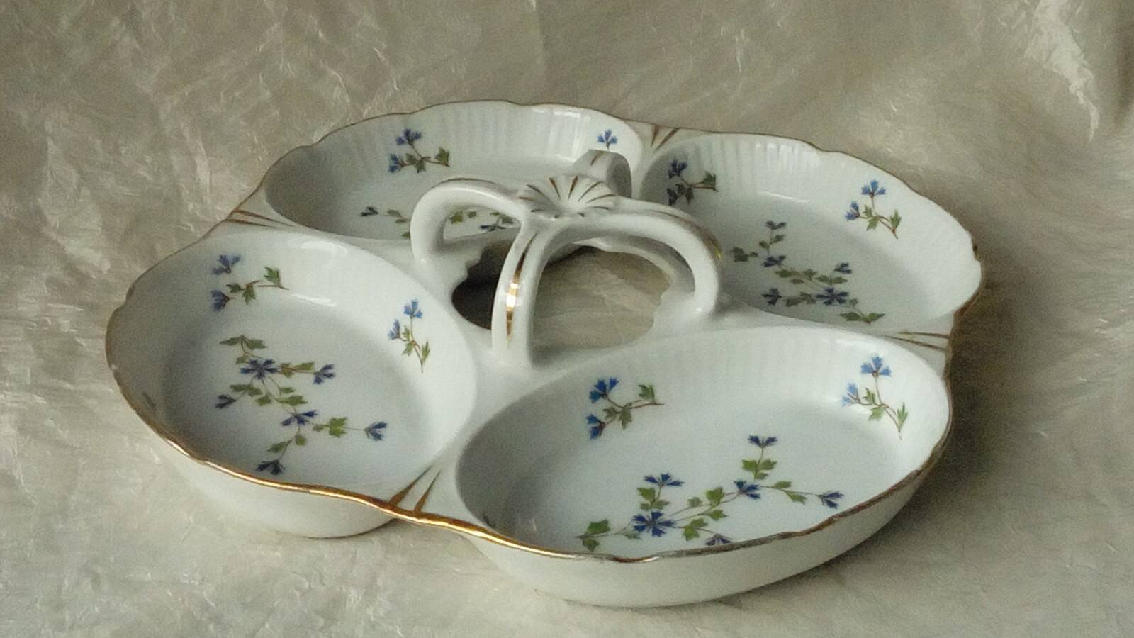 Louis lourioux foecy porcelain beggar's plate with barbell decoration