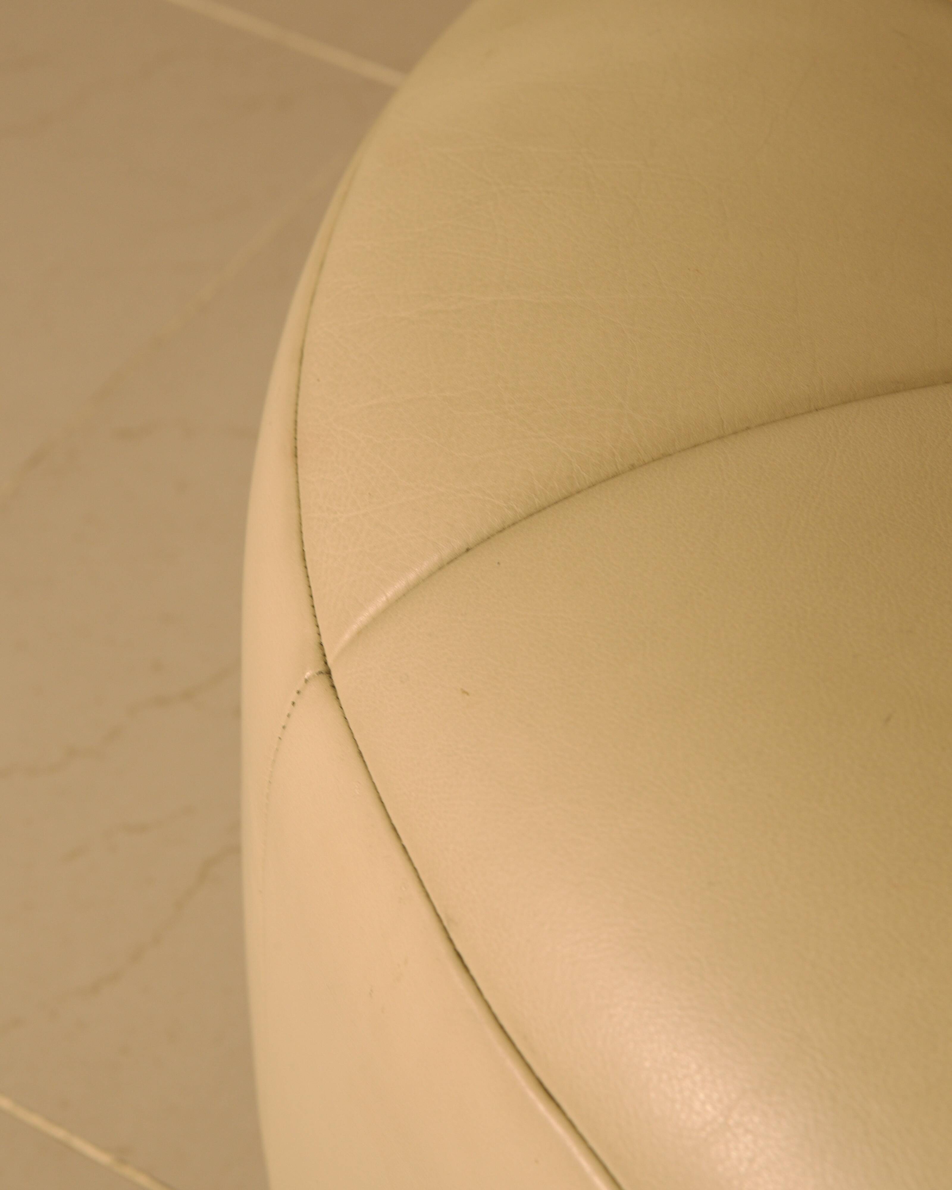 "Pumpkin" armchair set and its cream leather ottoman by Pierre Paulin
