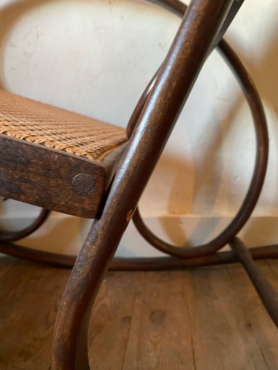 Wood and cane rocking chair