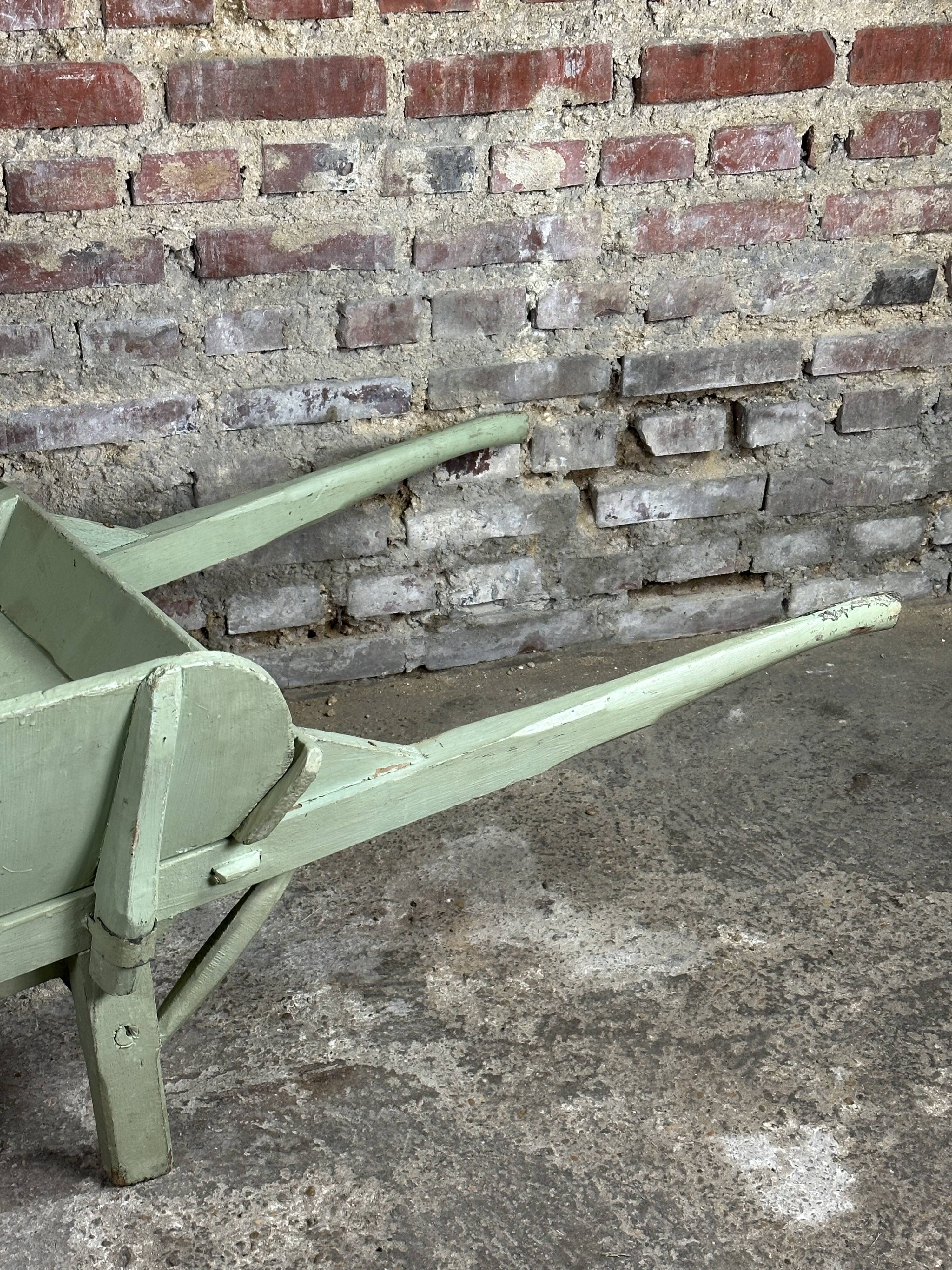 Antique wooden wheelbarrow