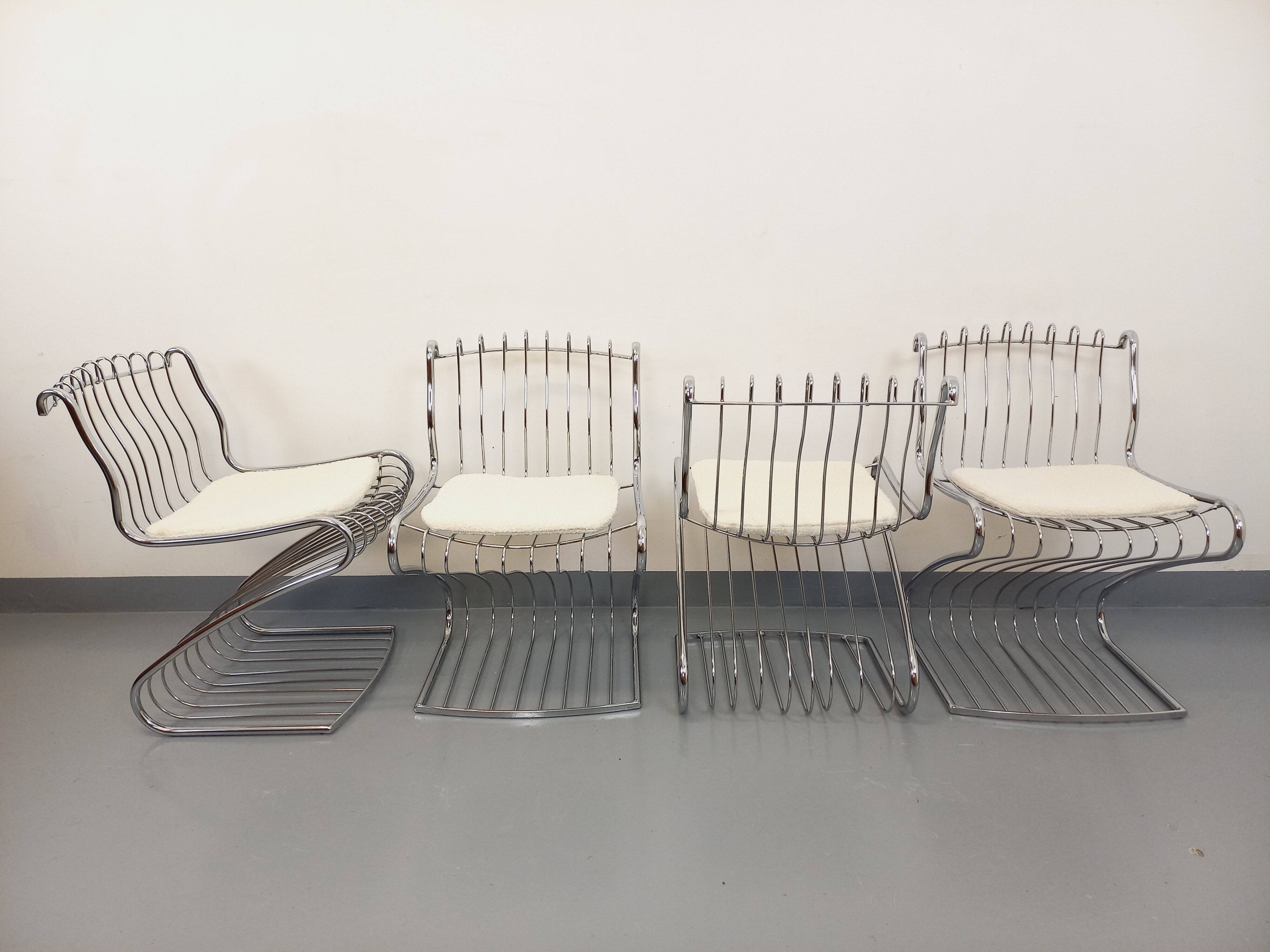 Set of 4 vintage Italian chairs by Gastone Rinaldi in chrome metal.