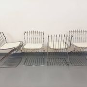 Set of 4 vintage Italian chairs by Gastone Rinaldi in chrome metal.