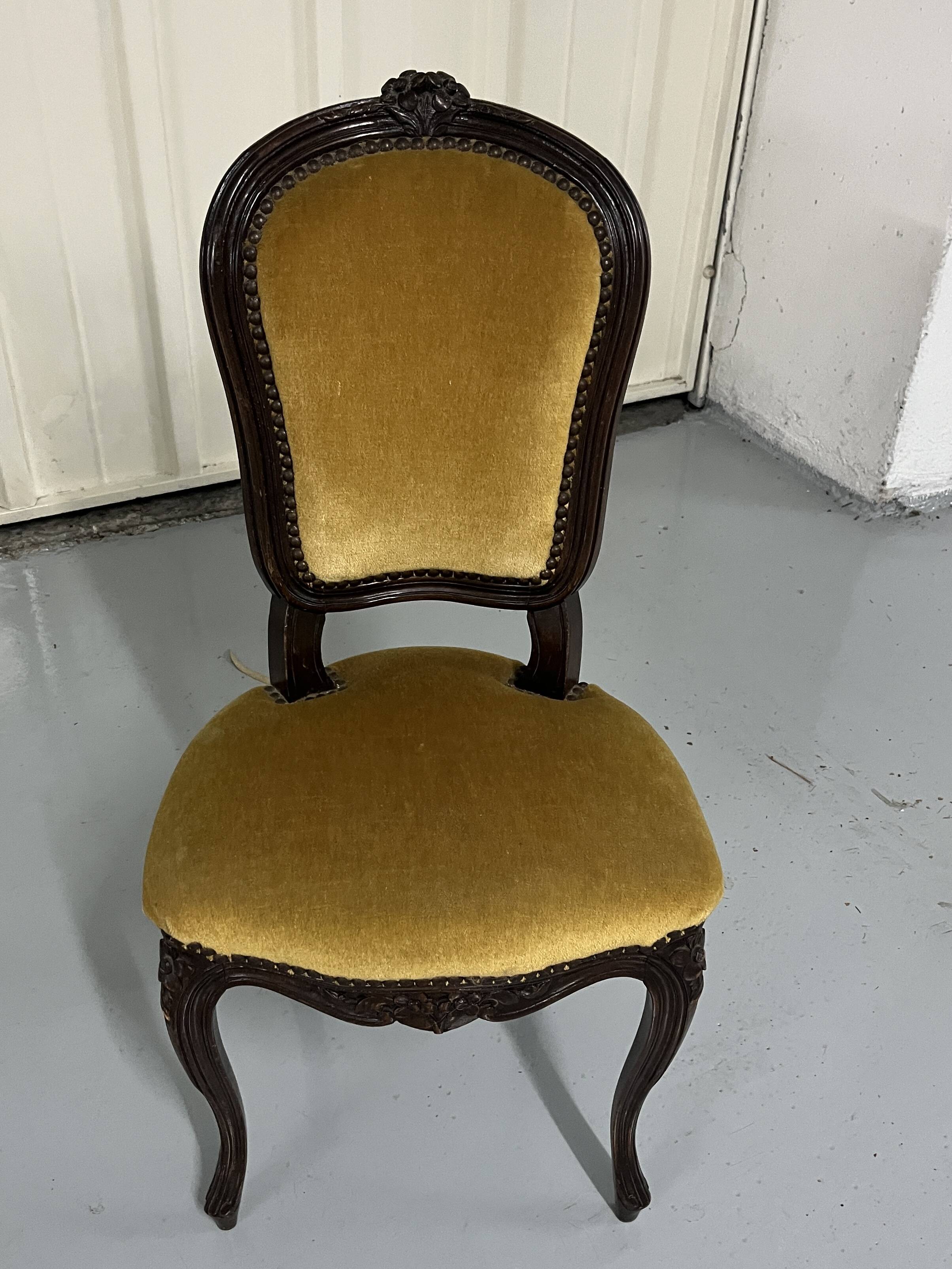 Old-fashioned secretary desk and chair set.