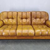 Three-seater sofa from the mid-century produced in Italy in the 1970s.