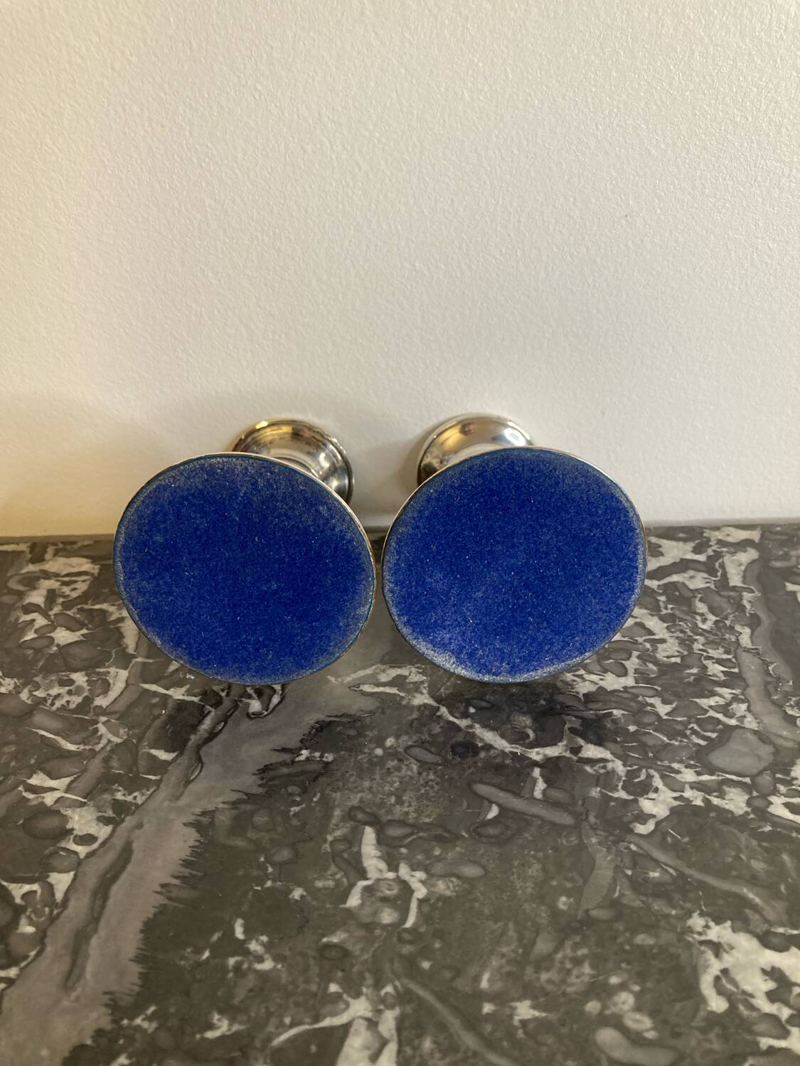 Pair of silver metal candlesticks