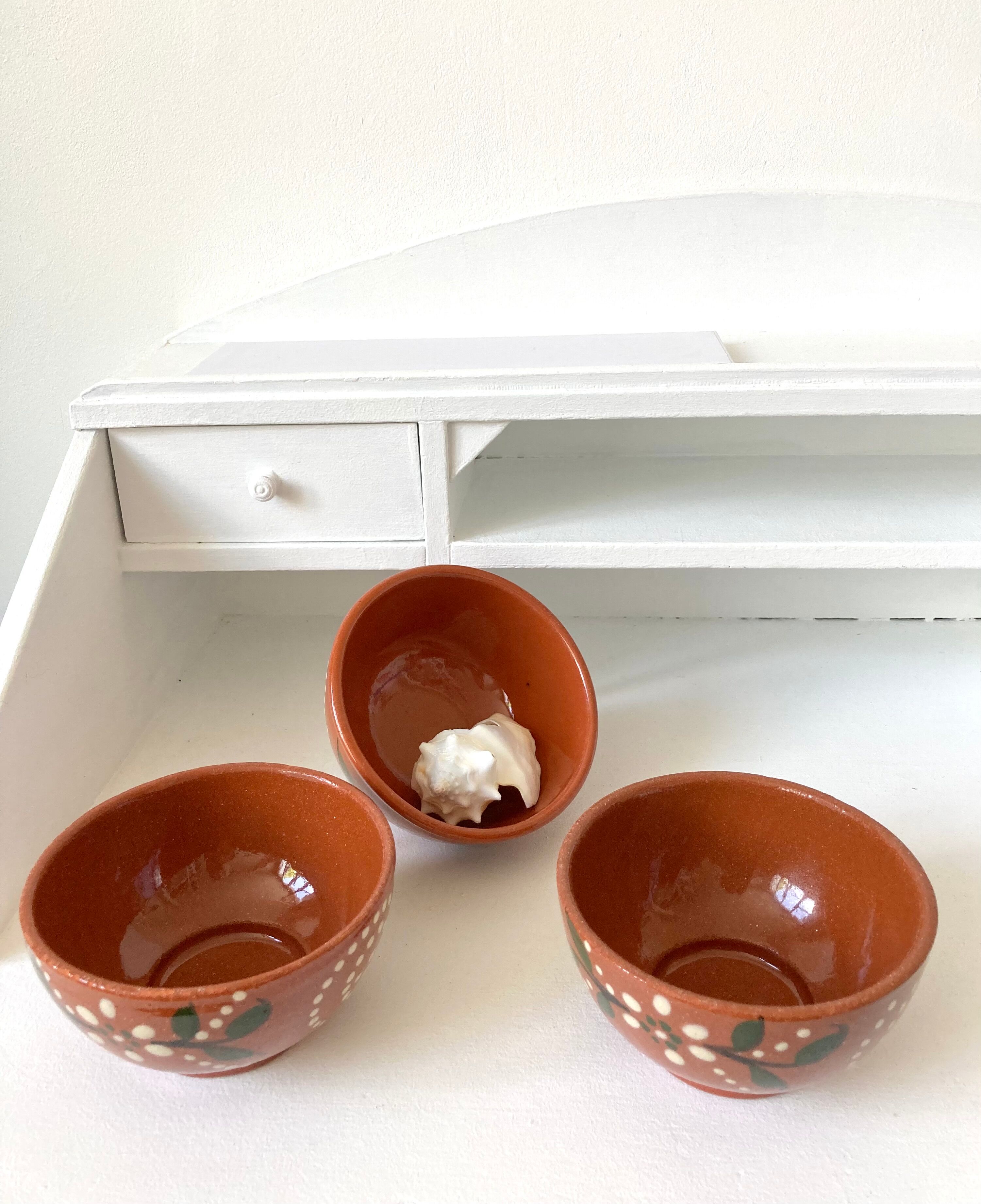 Vintage terracotta bowls decorated flowers