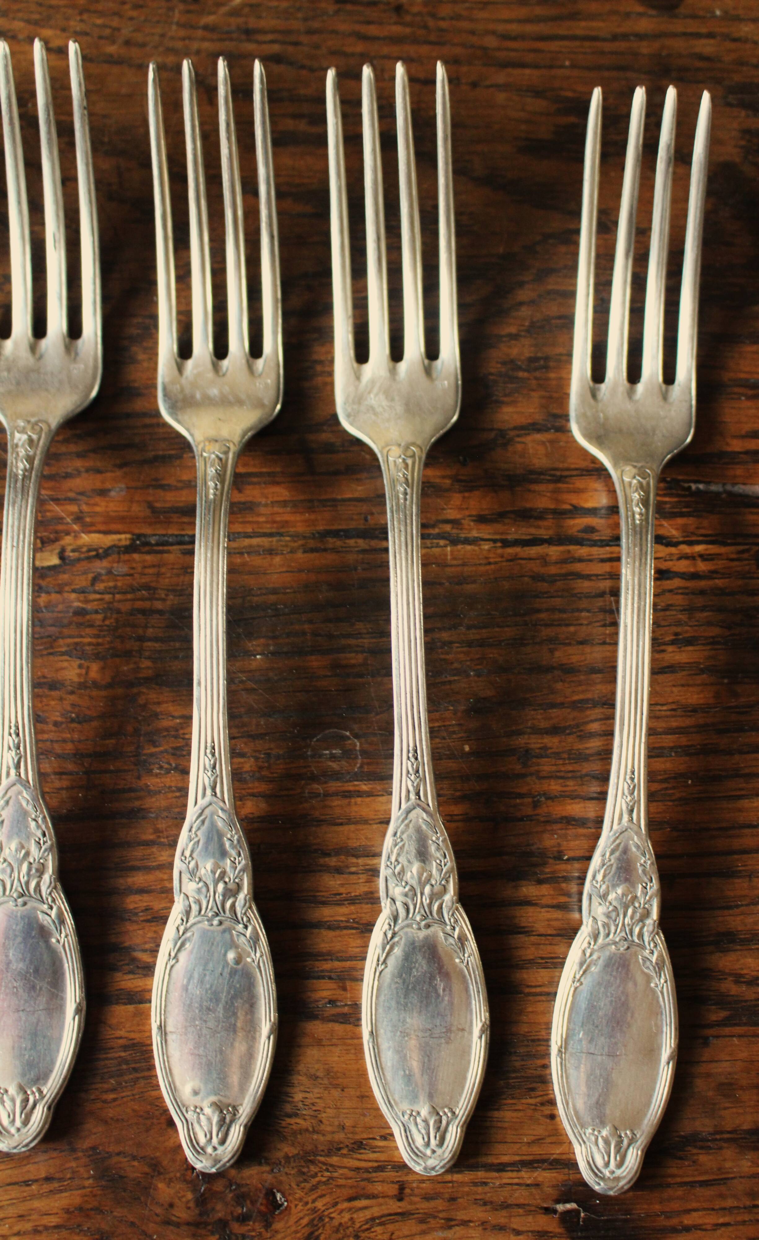A set of 6 silver-plated foliage forks