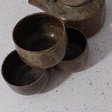 Teapot and its small bowls