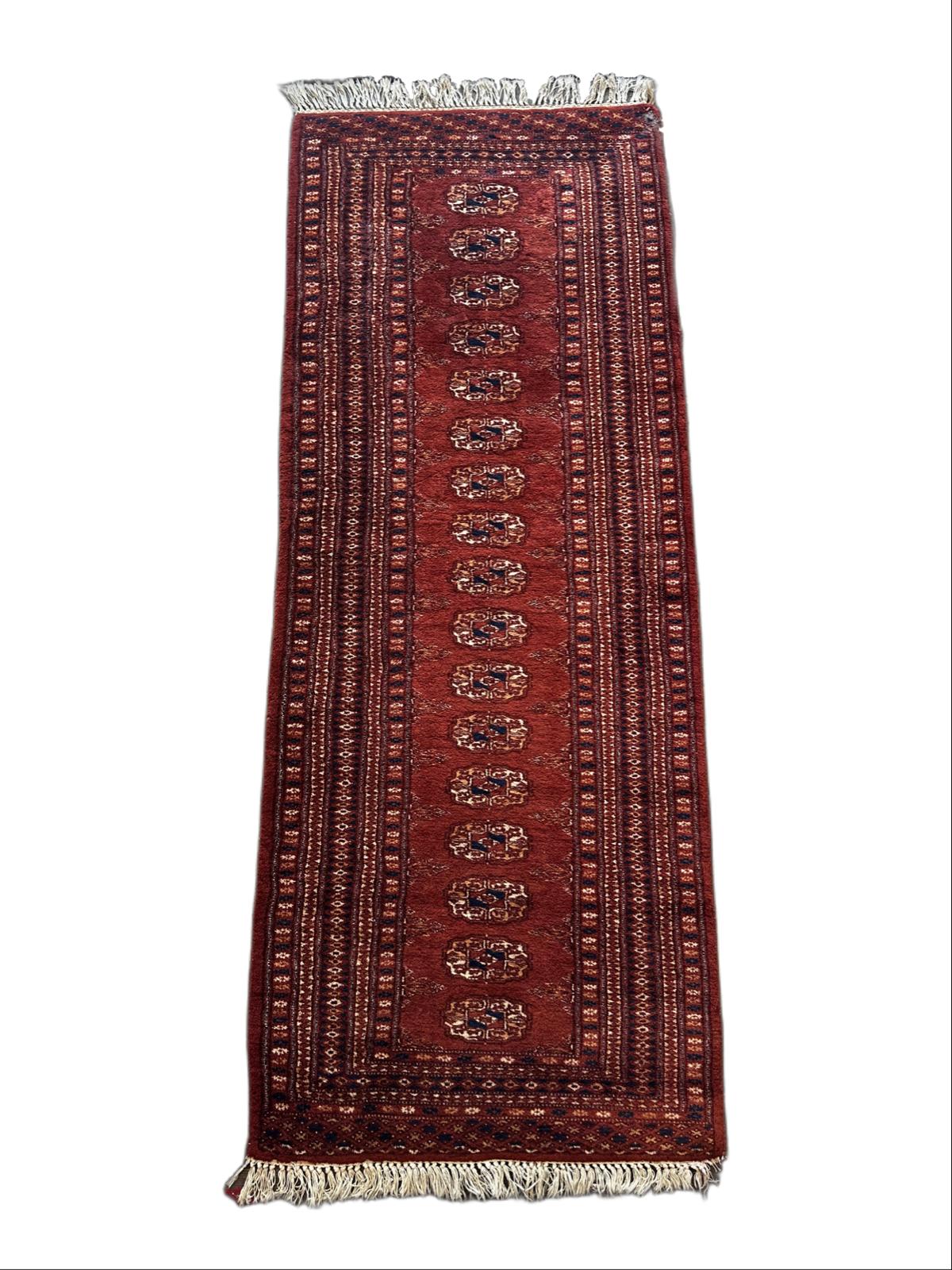 Handmade oriental hallway rug, 180cm x 70cm.