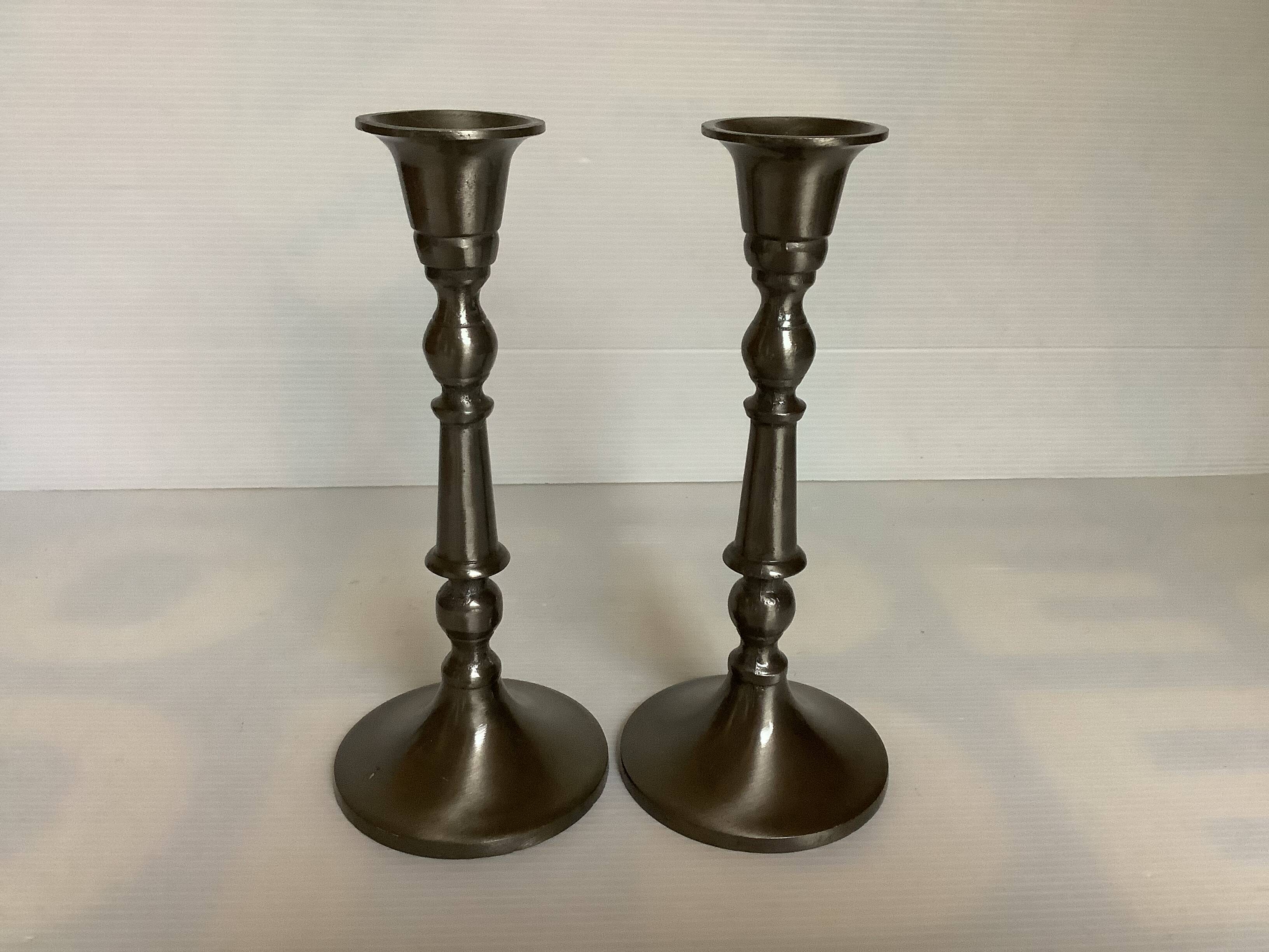 Pair of metal candlesticks