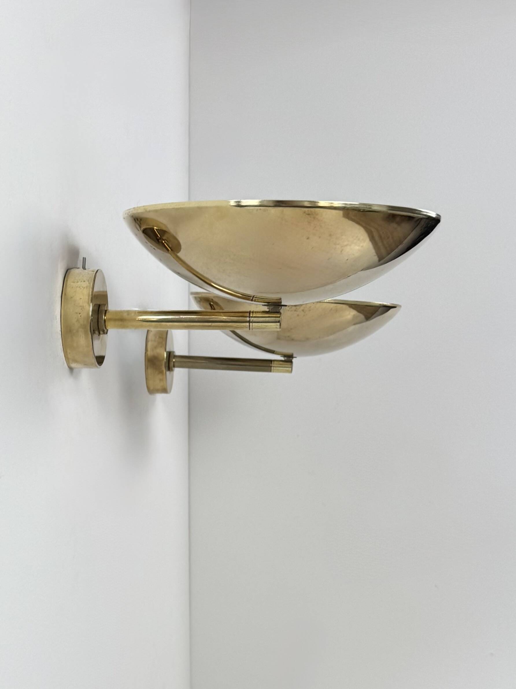 Pair of adjustable vintage wall lights, patinated brass, France, 1970.