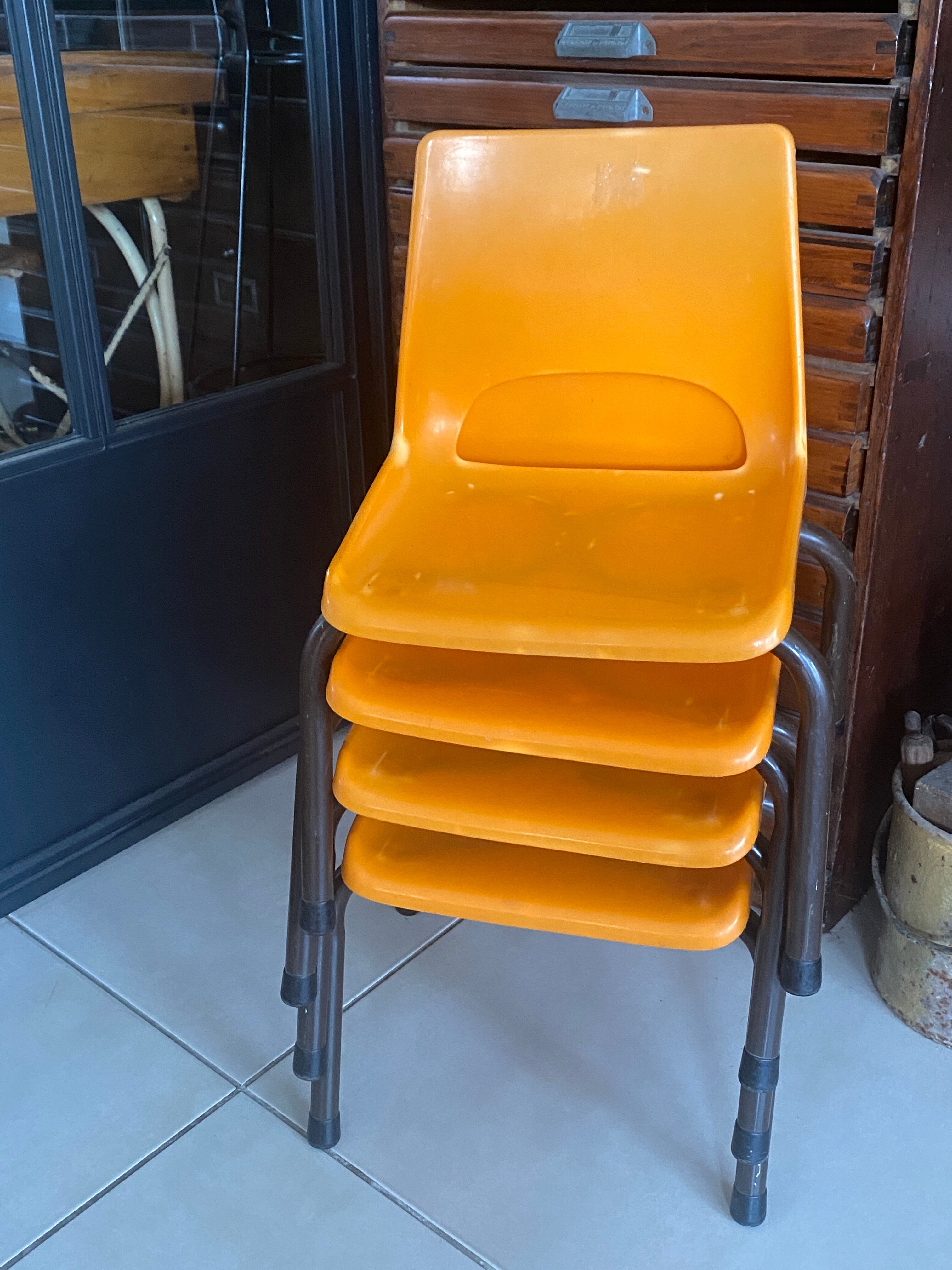 Set of 4 orange school chairs