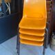 Set of 4 orange school chairs
