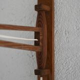 Wooden wall light with adjustable arm