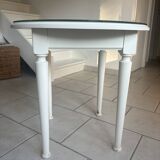 White wooden side table with glass top