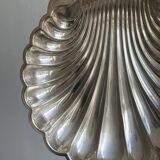 large silver-plated metal shell-shaped dish