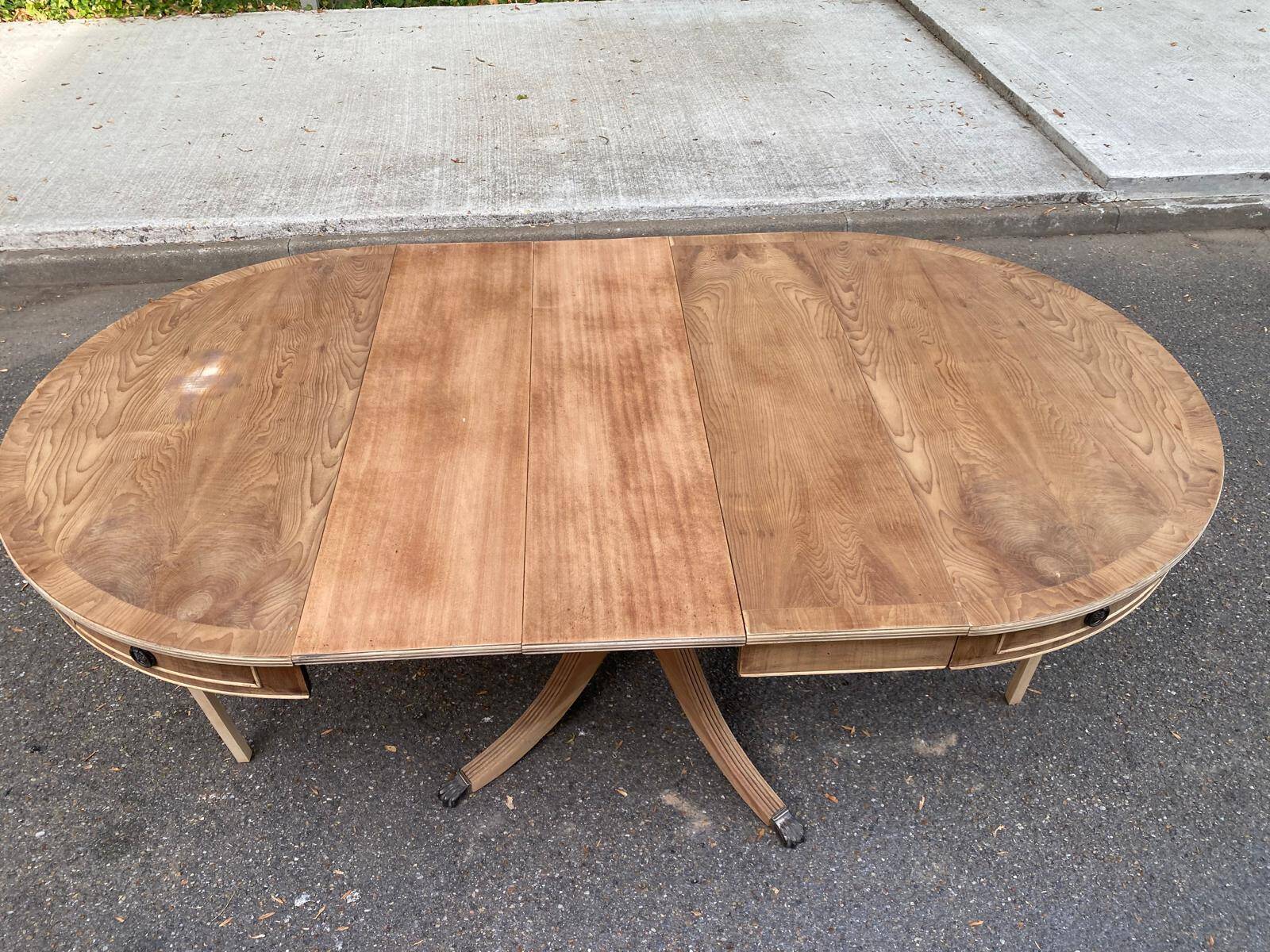 Round extendable dining table Regency central leg stripped mahogany 1960