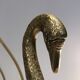 Brass swan magazine rack