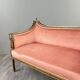 Louis XVI style canapé in carved wood and velvet, 20th century