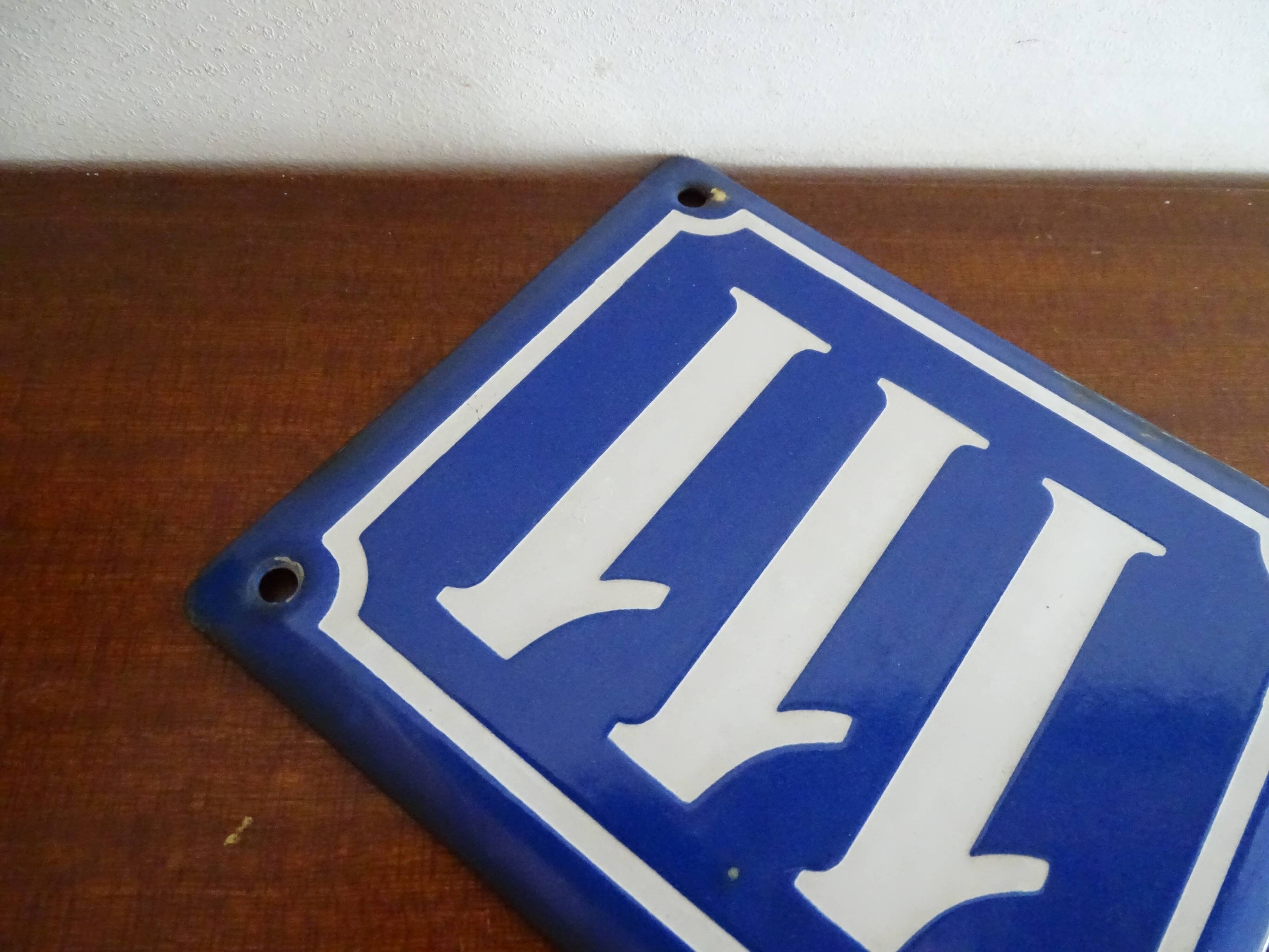 Old enamelled street sign - Street sign number 111