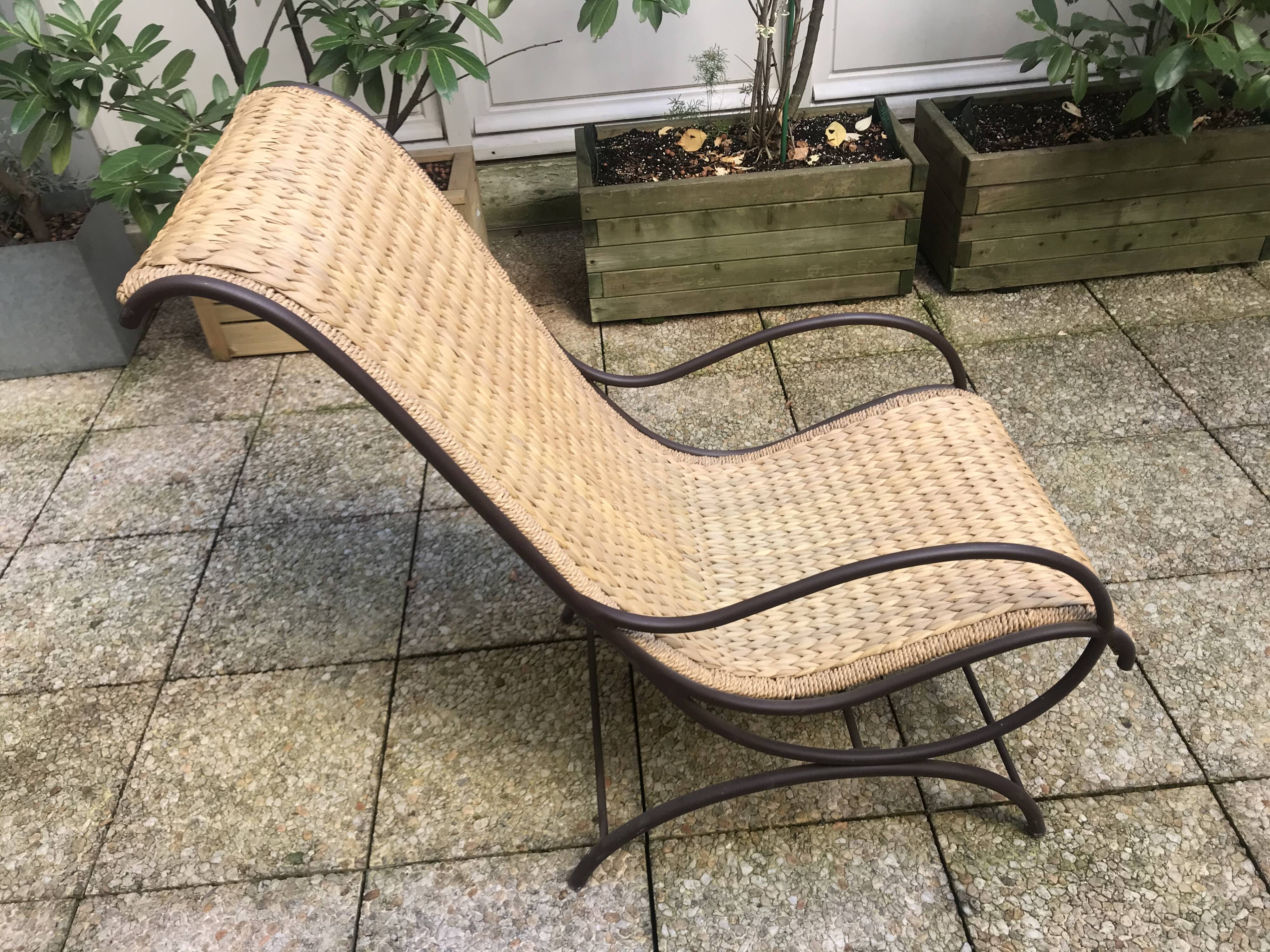 Lounge flesh wrought iron and braided wicker