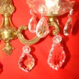 pair of bronze and crystal wall lights with 2 arms