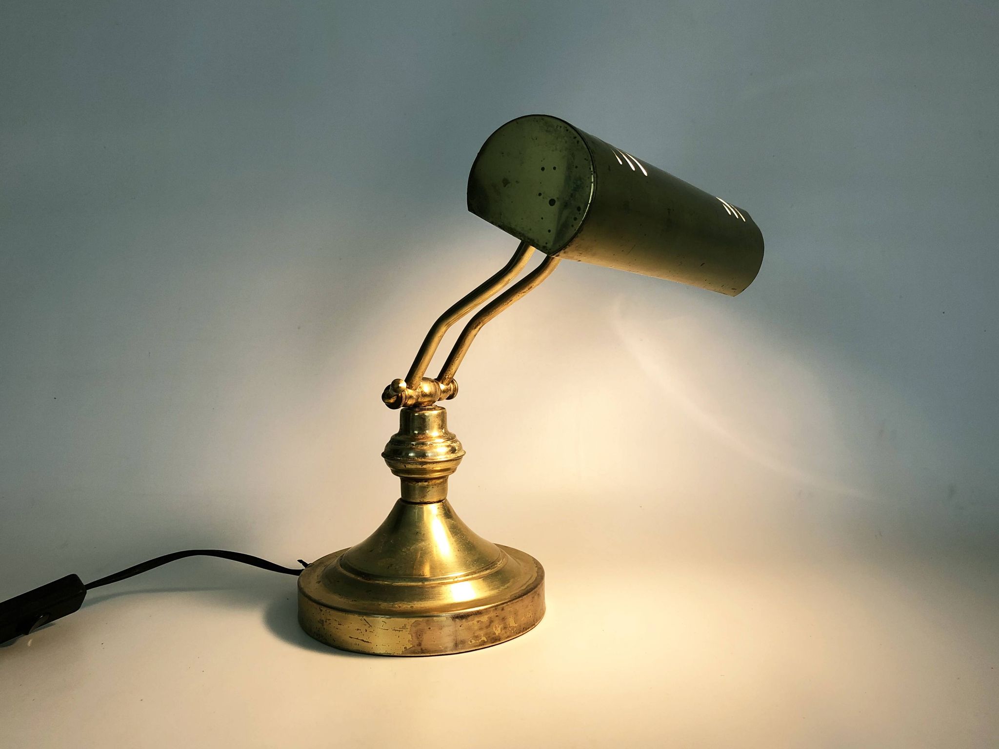 Old articulated piano lamp