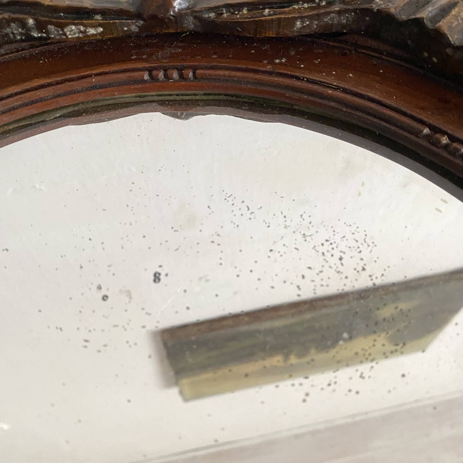 Miroir ovale mercure en bois sculpté décor nœud ruban 37X52