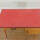 Bureau et chaise Baumann Pégase rouges, pieds compas